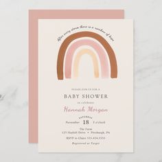 a baby shower card with a rainbow on it