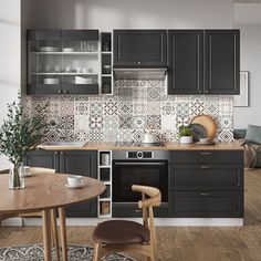 a kitchen with wooden floors and black cabinets, an oven in the center is surrounded by gray cupboards