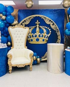 a blue and gold themed party with balloons