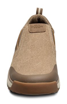 Designed with shock absorption and lightweight impact protection, this slip-on sneaker with a comfortable knit upper is designed for comfort and support. Water-resistant Textile upper and lining/rubber sole Imported Brown Low-top Slip-on Sneakers For Outdoor, Outdoor Slip-on Sneakers With Arch Support And Round Toe, Beige Slip-on Sneakers With Ortholite Insole, Slip-on Textile Walking Shoes With Arch Support, Textile Slip-on Walking Shoes With Arch Support, Outdoor Synthetic Slip-on Slip-resistant Sneakers, Outdoor Slip-resistant Synthetic Slip-on Sneakers, Textile Walking Shoes With Arch Support And Slip-on Design, Textile Slip-on Sneakers With Arch Support