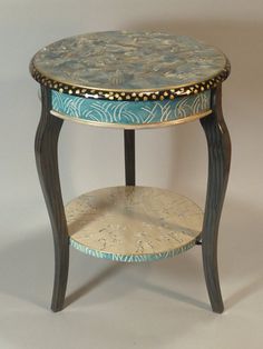 a small table with an ornate design on it