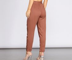 Keep it tied and tapered in these chic paperbag pants! Pair with a statement blouse to complete your look!Fit & Features High Rise Paperbag Waist Belt with Loops Slant Pockets Straight Leg | Tapered Hem Lightweight Woven Fabric Relaxed Fit Minimal Stretch Statement Blouse, Homecoming Outfits, Paperbag Pants, Children Shoes, Selling Clothes, Denim Pant, Trending Now, Waist Belt, Parachute Pants