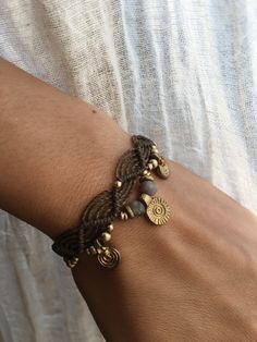 a close up of a person wearing a bracelet