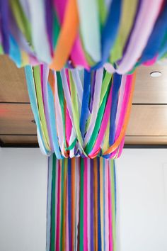 multi colored streamers hanging from the ceiling