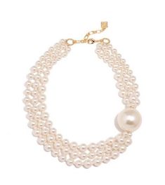 Collar necklace composed of pearlescent bead layers, accentuated with an oversized pearl, and completed with a lobster claw closure. -Lobster Claw -High Luster Coating Pearls -Scratch Resistant -19" Length -3" Extension -Nickel and Lead Compliant (Hypoallergenic) Chic Pearl Chain Choker, Chic Pearl Choker For Wedding, Chic Beaded Pearl Necklace, Elegant Multi-strand Pearl Necklace With Charm, Chic Pearl Drop Choker Necklace, Elegant Multi-strand Pearl Embellished Necklaces, Pearl White Multi-strand Pearl Necklace, Elegant Pearl Charm Beaded Choker Necklace, Elegant Beaded Pearl Charm Choker Necklace