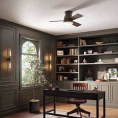 a home office with built - in bookcases, desk and ceiling fan is shown