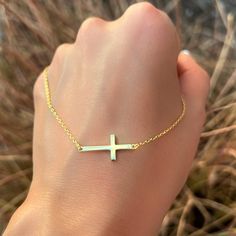 ✞ This dainty necklace features a sleek, minimalist sideways cross, offering a modern take on a classic symbol. Crafted with fine attention to detail, the cross delicately rests along a slender chain, creating a subtle yet meaningful statement. Lightweight and versatile, this necklace is perfect for layering or wearing solo for a touch of understated elegance. A timeless piece that effortlessly blends faith and style, making it an ideal accessory for any occasion. Minimalist Crucifix Necklace With Adjustable Chain, Minimalist Crucifix Jewelry With Adjustable Chain, Minimalist Crucifix Jewelry With Delicate Chain, Everyday Cross Necklace With Clavicle Chain, Everyday Clavicle Chain Cross Necklace, Minimalist Cross Necklace For Everyday, Minimalist Clavicle Cross Chain Jewelry, Simple Everyday Cross Jewelry, Adjustable Clavicle Chain Cross Necklace