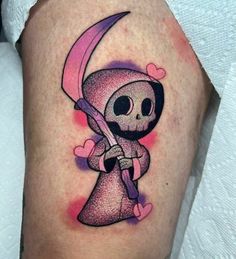 a tattoo with a skeleton holding a knife and heart shapes on the leg, it is pink