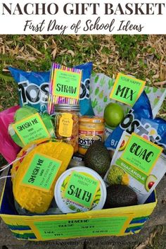 the nacho gift basket is full of snacks, condiments and other goodies