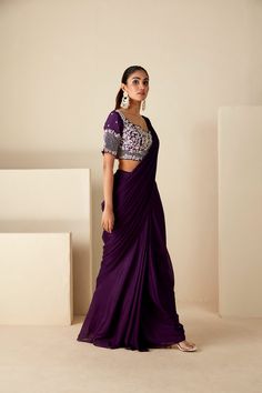 This ensemble features a precisely hand-embroidered blouse adorned with intricate handwork details, perfectly complemented by a pre-draped saree for effortless sophistication. Crafted from luxurious georgette crepe, it offers both comfort and style, with padded support and a fully lined finish ensuring a flawless drape. The convenient back hook opening adds ease of wear, while the cut work neckline adds an extra touch of glamour. Elevate your ethnic wardrobe with this exquisite ensemble, designe Bridal Shower Cocktails, Draped Saree, Drape Saree, Lehenga Saree, Cut Work, Embroidered Blouse, Skirt Length, Wedding Bride, Lehenga