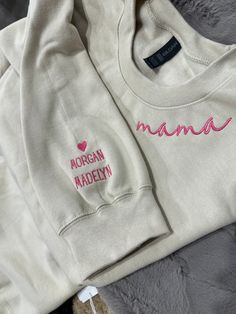 Customize an embroidered sweatshirt with your words on the neckline and your childrens & dogs names on the sleeve with these 2 fonts. Use this style to make this sweatshirt just right for you! Ex: Mama, Nana, Mimi, Gigi, Auntie, etc... Sweatshirt shown is mama in carnation thread on a sand sweatshirt and white thread on a military green sweatshirt. Script font on collar, Simple text font on sleeve. Unisex sizing! Available in Small - 4XL Printed on the softest Gildan Softstyle Unisex Sweatshirts Mother's Day Long Sleeve Sweatshirt With Embroidered Text, Long Sleeve Sweatshirt With Embroidered Text For Mother's Day, Mother's Day Sweatshirt With Custom Text, Personalized Long Sleeve Cotton Sweatshirt, Personalized Cotton Sweatshirt For Mother's Day, Customizable Family Matching Cotton Sweatshirt, Family Matching Custom Text Sweatshirt, Family Matching Cotton Sweatshirt With Custom Text, Jesus Sweatshirts