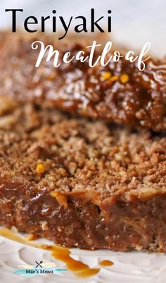 a close up of meatloaf on a plate with text overlay that reads teriyai meatloaf