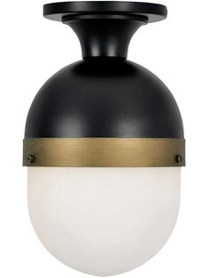 a black and white light fixture with a gold trim on the top, against a white background