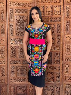 -This Beautiful Long Mexican Colorful Floral Dress is the perfect dress for a fun night out or a special event. -It is full of colorful embroidered flowers and has some crocheted details. -This dress has ties on the back in order to adjust the fit. - You can purchase the dress either with or without the belt. Please note: The accesories shown with this dress may purchased as well and Can be found in this links Earrings:https://www.etsy.com/es/listing/855938626/aretes-mexicanos-de-filigrana-arete Pink Short Sleeve Embroidered Dress For Party, Multicolor Embroidery Short Sleeve Party Dresses, Knee-length Dresses With Multicolor Embroidery, Short Sleeve Embroidered Dress For Party, Multicolor Embroidered Short Sleeve Dress For Party, Pink Embroidered Midi Dress For Party, Short Sleeve Embroidered Dress With Multicolor Embroidery For Party, Party Dress With Multicolor Embroidery And Short Sleeves, Pink Embroidered Fitted Midi Dress