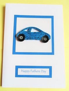 a father's day card with a blue toy car on the front and bottom