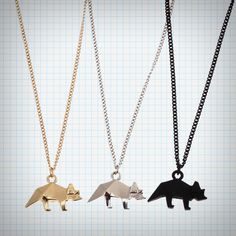 Cute+dinosaur+necklace+with+paper+origami+theme,+available+in+silver,+gold+and+black!  Chain+is+44CM+long,+charm+is+5CM. Origami Necklace, Dinosaur Necklace, Origami Jewelry, Paper Origami, Cute Dinosaur, Black Chain, Stationery Items