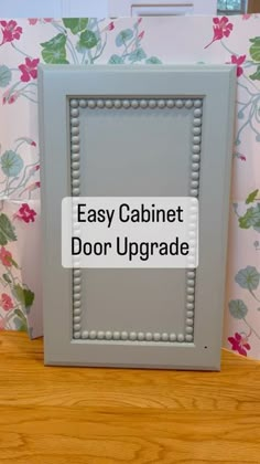 an easy cabinet door upgrade with beaded trim on the bottom and sides, in grey