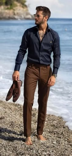 Got a big date or work presentation coming up? Well, you want to dress to impress, and mismatching the colors of your outfit can put a wrench in your plans. So, what color shirt goes with dark brown pants the best? We’ve got the lowdown, so you don’t have to do the research. Find our color matches and recommendations below. Dark Brown Dress Pants, Outfits Quotes, Dark Brown Dress, Stylish Shirts Men