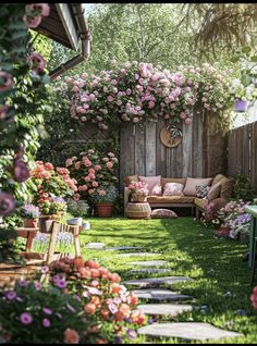 a garden with lots of pink flowers and greenery on the walls, along with an outdoor seating area