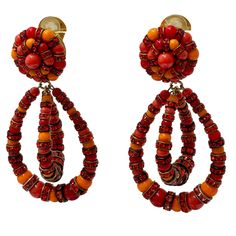 This an iconic style from designer Francoise Montague in a mix of orange hue. Made with Swarovski Crystal rondelles and handmade glass beads . These are clip earrings. Francoise Montague took over the De Saurma jewelry workshop in the late 1940s. Her mother founded the workshop in 1945, according to "Costume Jewelry for Haute Couture" by Florence Muller. The established business included a global clientele and boutique in Paris. After Montague took over, her most important clients were Nina Ricc Jewelry Workshop, Handmade Glass Beads, Couture Jewelry, Iconic Style, Clip Earrings, Grand Prix, Swarovski Crystal, Costume Jewelry, Clip On Earrings