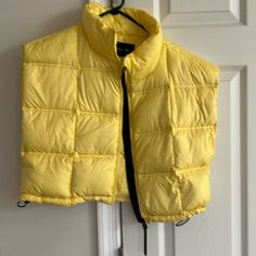 New Without Tags Crop Square Quilted Puffer Vest In Soft Yellow With Wingard In Black Twill Zipper Guard Pull Ties On The Side Size Small Crop Puffer Vest, Quilted Puffer Vest, Butter Yellow, Soft Yellow, Puffer Vest, Square Quilt, Yellow Color, Black N Yellow, Lockers