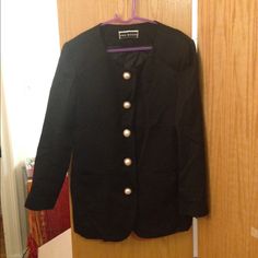 Brand New, Never Worn, No Tags. Got This Decades Ago And Never Wore It. Vintage Saks Fifth Avenue Black 100% Wool Blazer Jacket With Large Pearl And Gold Buttons Down Front. Rounded Neckline With No Lapels, Great To Wear As A Car Coat Or Blazer. Fully Lined, Excellent Quality. Shoulder Pads, Structured Shoulders. Notched Back Tail Hem. Size 6. Long Sleeve Button Closure Career Blazer, Workwear Blazer With Covered Buttons, Formal Button-up Outerwear With Covered Buttons, Long Sleeve Blazer With Covered Buttons For Work, Classic Long Sleeve Blazer With Covered Buttons, Button-up Blazer With Covered Buttons For Work, Vintage Career Outerwear, Formal Blazer With Snap Buttons, Formal Long Sleeve Outerwear With Snap Buttons