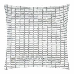 a white pillow with silver lines on it