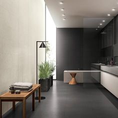 a modern kitchen with black and white decor