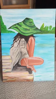 a painting of a woman sitting on a dock with a green hat over her head