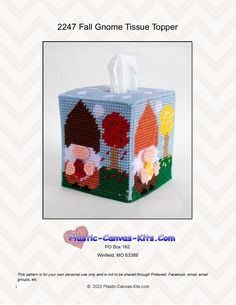 a tissue box with flowers on it is featured in the pattern for an ornament