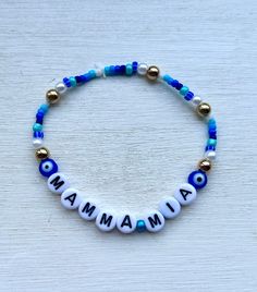 the perfect gift for a mamma mia! fan! colour of letter beads subject to change. Mamma Mia Bracelet Ideas, Mamma Mia Games, Blue Name Bracelet With Colorful Beads As Gift, Adjustable Blue Name Bracelet With Colorful Beads, Summer Letter Beads Bracelet, Bohemian Blue Personalized Friendship Bracelets, Blue Letter Beads Stretch Bracelet For Birthday, Personalized Blue Beaded Bracelets For Beach, Blue Letter Beads Friendship Bracelet For Birthday