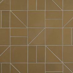 a close up view of a wall made out of squares and rectangles in brown