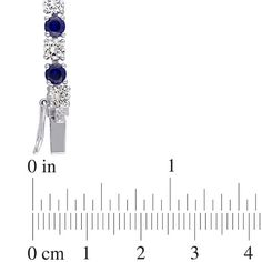 Give your tailored look the jewelry boost it’s craving with this sparkling fashion tennis bracelet. Crafted in sterling silver, this classic-with-a-twist style features 4.0mm lab-created bright blue sapphires alternating continuously with lab-created bright white sapphires along the design. Simply divine, this dazzling 7.25-inch bracelet is buffed to a brilliant luster and secures with a tongue and groove clasp. Twist Styles, Twist Style, Peoples Jewellers, Tongue And Groove, Sapphire Stone, White Stone, White Sapphire, Tennis Bracelet, White Metal