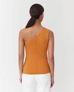 A staple for your warm-weather wardrobe and an essential layer for breezier days, woven from soft and sustainable Pima cotton. Chic Tops For Warm Weather, Fitted Tops For Warm Weather, Sustainable Cotton Top For Summer, Waste Collection, One Shoulder Top, Asymmetrical Neckline, One Shoulder Tops, Pesticides, Black Media