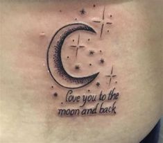 a woman's stomach with the words love you to the moon and back written on it