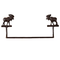 an iron towel rack with two moose figurines on it's sides,