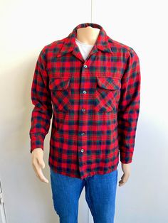 Near mint Pendleton Men's Red plaid wool flannel shirt. 1950's/60's. Size Medium. Loop collar. One small moth hole on back panel-see photo. Two breast flap pockets. Button placard cuffs. Newly cleaned. Machine washable. Bright red with green and navy plaid. Measurements flat: Chest 21"W,  Sleeve inseam 21"L, Length from back of collar  29-1/2"L, Shoulder top seam to seam 19"W. Vintage Plaid Shirt With Pockets, Retro Collared Flannel Shirt With Pockets, Retro Cotton Flannel Shirt For Winter, Vintage Button-up Flannel Shirt With Pockets, Vintage Plaid Flannel Shirt With Pockets, Vintage Flannel Button-up Shirt With Pockets, Retro Button-up Flannel Shirt, Vintage Collared Flannel Shirt For Winter, Vintage Winter Shirt With Pockets