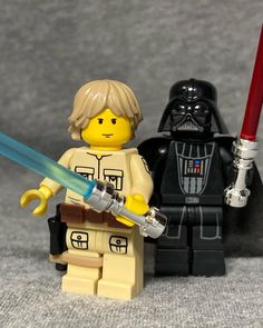 lego star wars characters with lightsaben and darth vader