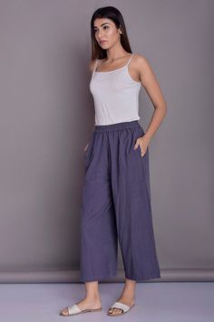 Loose linen pants, Casual Baggy Pants, Grey linen pants - Custom made by Modernmoveboutique>DESCRIPTION:- loose and roomy- side pockets- made from Linen blend. The fabric is of medium weight (185 g).- the model is 172 cm high (regular XS - S) and is wearing size S. - color in the picture - GRAPHITE (Please choose any other color on the right).>COLORSIZING< (XS)BODY- waist in (cm) 23.25 '' (59 cm) - hips in (cm) 33.75 '' (86 cm)(S)BODY- waist in (cm) 25.25 '' (64 cm) - hips in (cm) 35.50 Grey Linen Pants, Loose Linen Pants, Long Linen Skirt, Pants Custom, Casual Linen Pants, Linen Tank Top, Button Skirt, Linen Casual, Baggy Pants