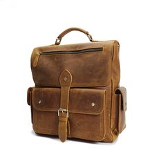 Our classic leather backpack available in brown and coffee colors which is as timeless as it is versatile. It is perfect for daily use as a book bag. gym bag or travel bag on a long journeys. This luxury leather backpack can comfortably accommodate a 14â€?laptop and A4 notepad.This product will be shipped by Expedited Free DHL shipping method.Features 100% full grain leather 14.6" x 14.6" x 7.1â€?/li> About 4 Ibs Multi outside pockets Safe buckle closure Hidden inside zipper pocket Classic Brown Leather Backpack For Daily Use, Rugged Leather Backpack For Travel, Rugged Leather Travel Backpack, Brown Large Capacity Bag For Everyday Carry, Luxury Brown Laptop Backpack, Brown Satchel Laptop Bag For Trip, Classic Brown Leather Backpack For Everyday, Classic Rectangular Laptop Bag For Trip, Brown Laptop Bag With Luggage Sleeve For Trip