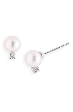 Glittering diamonds accent luminous pearl earrings. 1/4" drop. Post back. Pearl size: 6-6.5mm. Total diamond weight: 0.06ct. Color: G. Clarity: VS2. Grade A+ Akoya cultured pearl/18k white gold/diamonds. By Mikimoto; made in the USA of imported materials. Asian Owned. Akoya Pearl Diamond Earrings With Diamond Accents For Evening, Evening Pearl Earrings With Diamond Prong Setting, White Brilliant Cut Pearl Earrings For Evening, Akoya Pearl Earrings With Diamond Accents In Diamond White, White Round Cut Diamond Earrings For Evening, White Single Diamond Earrings For Formal Occasions, White Pearl Earrings With Diamond Accents For Evening, Timeless Diamond White Pearl Earrings With Diamond Accents, Pearl Earrings With Diamond Accents, Round Cut