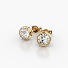 14K Yellow Gold Bezel Diamond Stud Earrings (1.00 CTW - H-I / SI1-SI2). This hand crafted, bold design accents the beauty of the round brilliant diamonds by using a thin bezel and circle accented basket. These earrings will fit snugly against the ear and features friction backs. Bezel Diamond Earrings, Everyday Earrings Simple, Gold Earrings Models, Gold Jewellery Design Necklaces, Beaded Collar, Notes Template, Diamond Stud Earrings, Jewelry Design Necklace, Fine Jewelry Designers