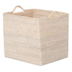 a large woven storage basket with handles on the bottom and sides, in natural colors