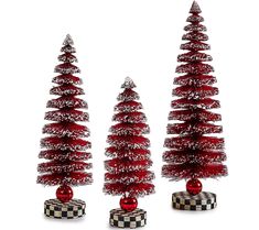 three red christmas trees with black and white checkers