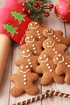 gingerbreads decorated with icing on a wooden table