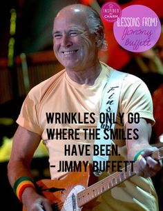 an older man smiles as he plays his guitar with a quote from jimmy buffet on it