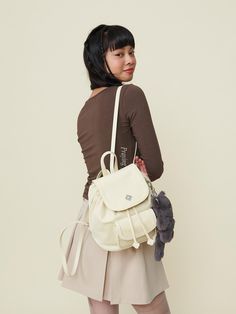 Composition : Nylon + CowhideColor : BUTTERY WHITECountry of Origin : CHINA Casual White Student Backpack, White Nylon Casual Backpack, Casual White Nylon Backpack, Trendy White Nylon Backpack, Trendy White Backpack With Adjustable Strap, Functional Cream Backpack, Trendy White Nylon Bags, White Backpack With Adjustable Strap For Students, White Nylon School Backpack