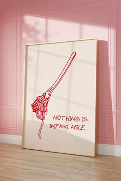 a red and white poster with the words nothing is impastable on it in front of a pink wall