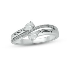 Express your affection with this lovely promise ring, featuring two pear-shaped white lab-created sapphires shining above and below a glittering ribbon of round diamonds. Crafted in sterling silver, the contoured band is engraved with both of your names – up to six letters on each side – for a personal touch. The ring has a total diamond weight of 1/10 carat. Diamond Promise Ring, White Lab, Diamond Promise Rings, Kay Jewelers, Silver Prices, Sapphire Stone, White Sapphire, Sapphire Diamond, Diamond Stone