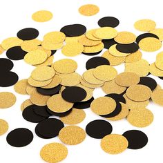 black and gold glitter confetti dots on white background with one circle in the center